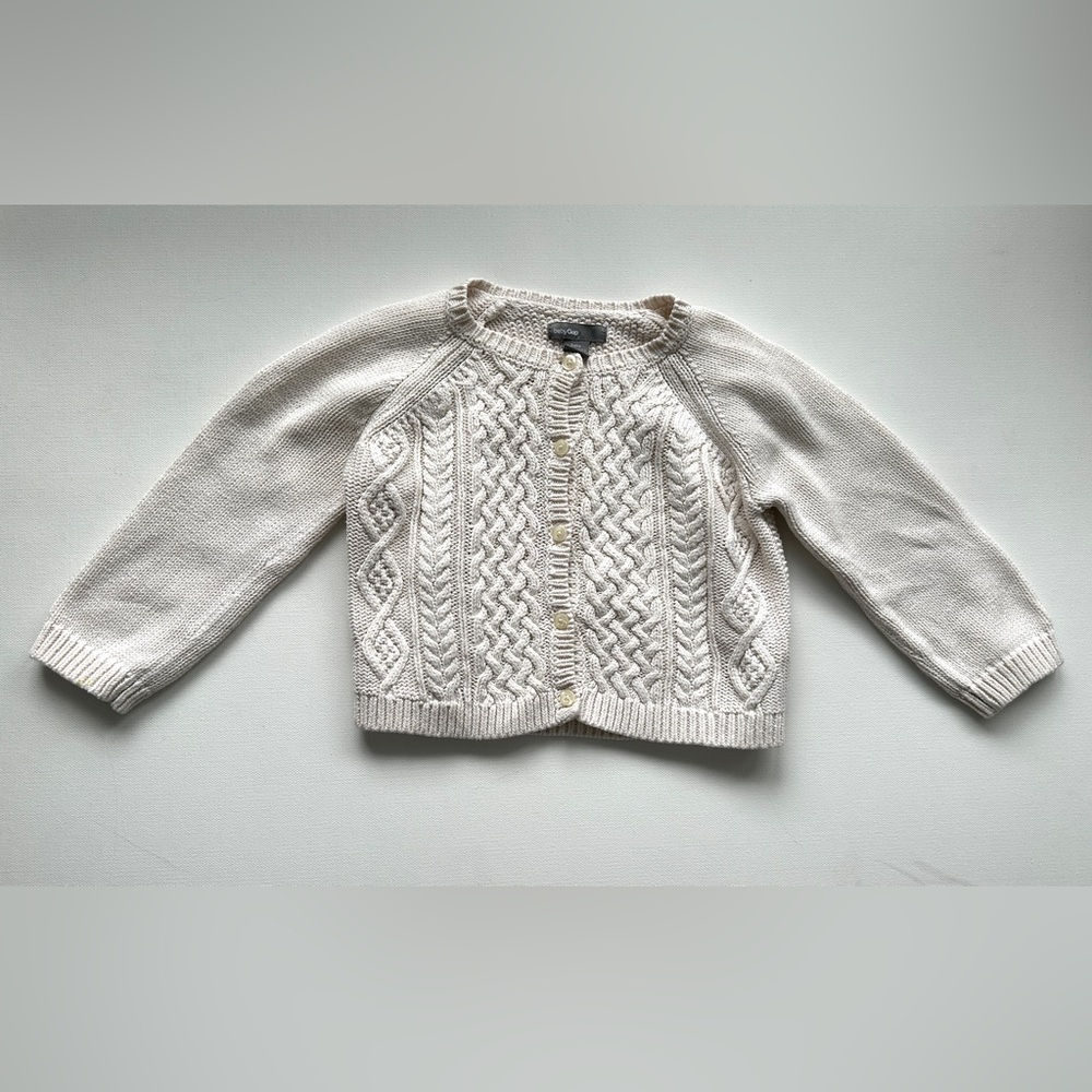Baby Gap girl’s cardigan with button-up front, cable knit pattern.  Size 18-24M.